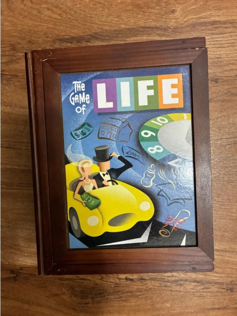 Hasbro The Game of LIFE Board Game Cover - Yellow Car with Blue Background